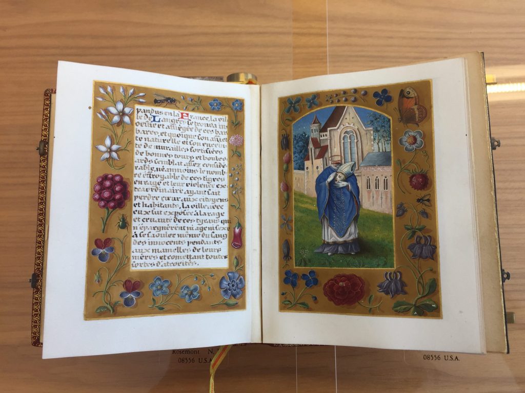Bishop Didier of Langres, decapitated, holding head in hands, fols. 16v–17r. Life of Saint Didier, Gothic Revival Manuscript, 1902. Karen Gould Collection #51, Gift of Lewis Gould. Spencer Art Reference Library, The Nelson-Atkins Museum of Art. (Photo: Virginia Blanton)