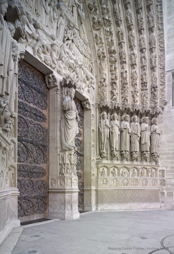 Fig. 12 Notre-Dame of Paris, detail of Fig. 1, with an oblique view of the central portal, showing the socle reliefs of the virtues and vices on the right embrasure, c. 1210 (Photo: Andrew Tallon © Mapping Gothic France, The Trustees of Columbia University, Media Center for Art History, Department of Art History & Archaeology).
