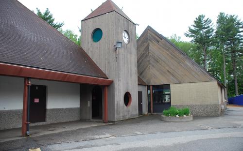 Photograph of Bancroft Elementary School’s wooden clock tower that looks like a castle turret.