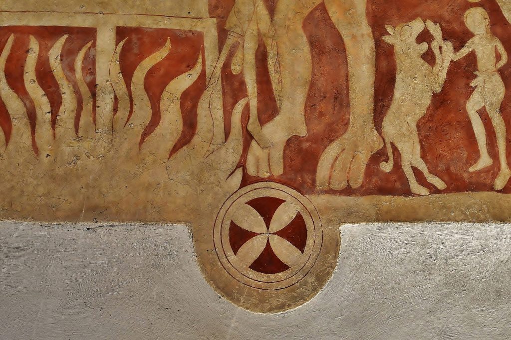 Detail of circular consecration cross with four segments at the bottom of mural painting.
