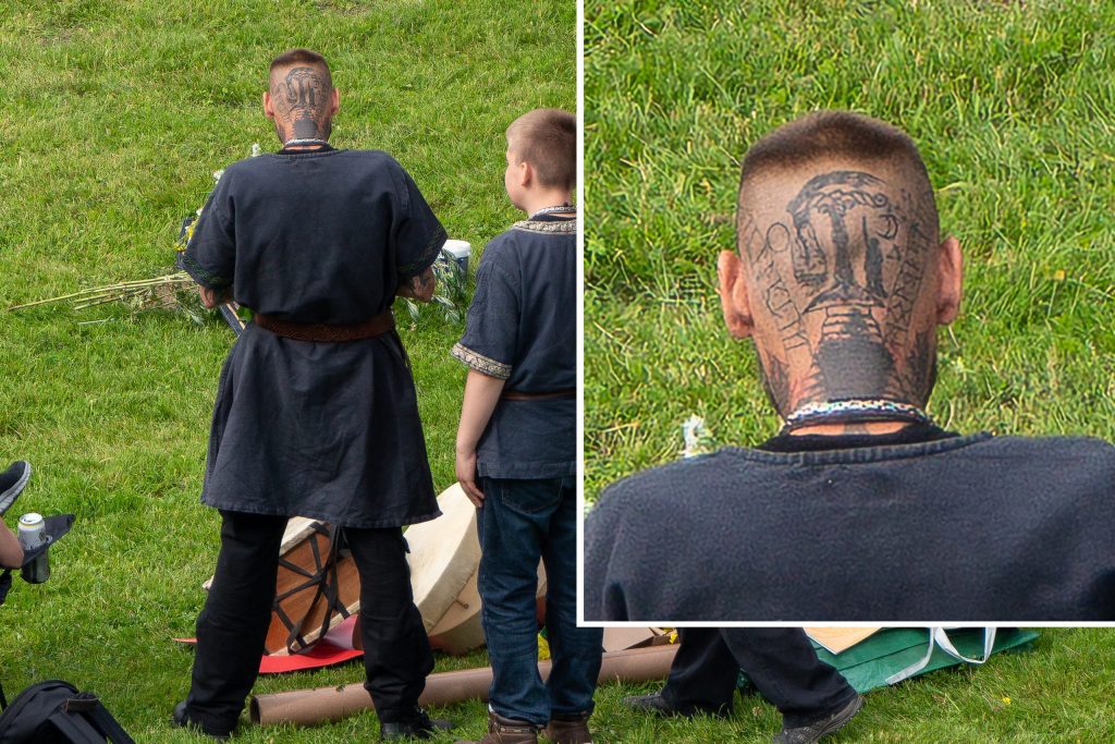 A man and boy wearing tunics face away. The back of the man’s tattooed head is enlarged in an inset image.