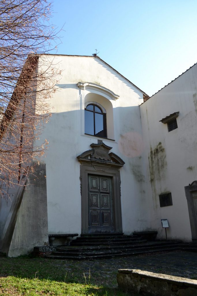 White façade of a simple church.