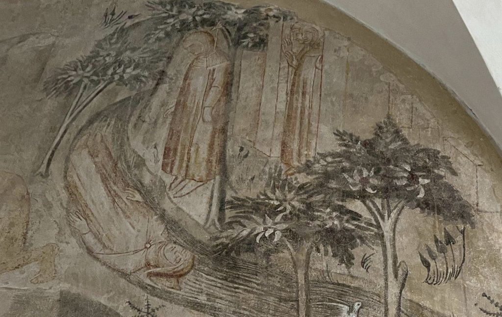 Fresco of two women hanging.