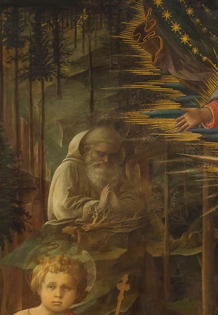 St. Romuald praying over a felled tree in Lippi’s Adoration in the Forest.