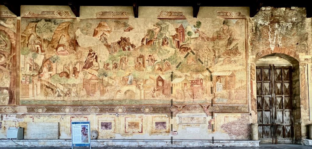 Buffalmacco’s fresco known as the Thebaid, or Scenes of the Desert Fathers, with later additions by Antonio Veneziano, in the Camposanto. Broken lines superimposed on the photo show the approximate outline of the former tomb monument of the hermit Giovanni Cini (Veneziano’s additions are within those lines).