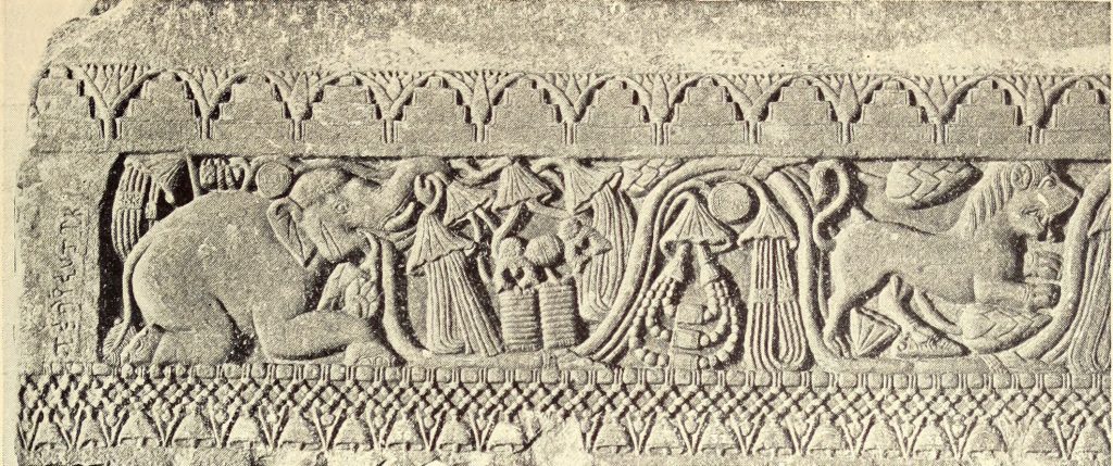 Alt text: Reproduction of decorative motif with elephant, lion, lotus blooms and jewels.