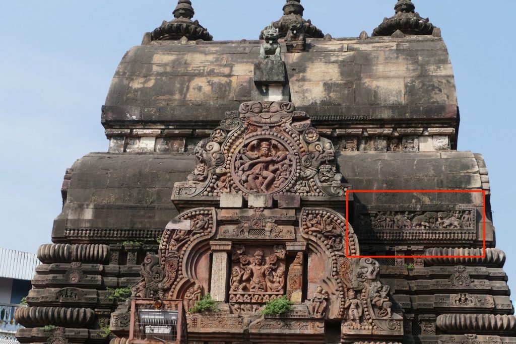 Tower of Vaital temple, with Shiva and Surya on vajramastaka. Position of relief with king and elephant is highlighted. Bhubaneswar, Odisha.