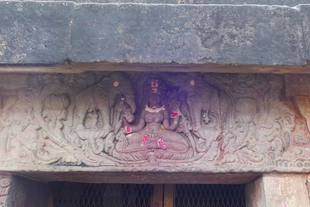 Seventh century stone relief of Gajalakshmi. Lakshmi is seated on a lotus flower, lustrated by two elephants. From Parasuramesvara temple, Bhubaneswar, Odisha.