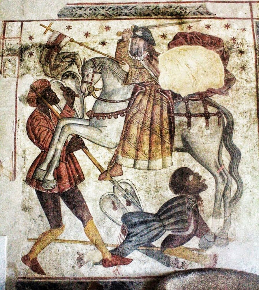A light-skinned knight with a scallop shell on his hat sits atop a large white horse whose legs cross a dark-skinned figure with shield and spear. Below, a beheaded, dark-skinned body is crumpled with his decapitated head placed on his rear. 