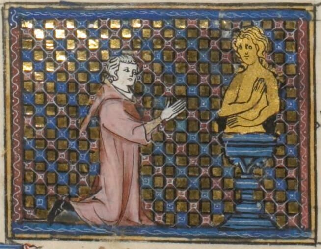 Fig. 13: Pygmalion kneels before a golden bust of a female figure which is placed on a short pedestal.