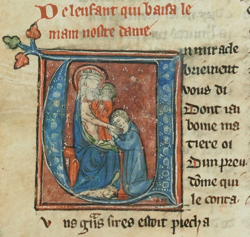 Fig. 1: Viewed in profile and set within a historiated initial, a young boy kneels in front of a statue of the Virgin and Child. Her right arm is extended as the boy holds her hand in his.