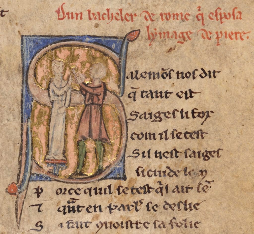 Fig. 3: Viewed in profile and set within a historiated initial, a young man stands in front of a clothed statue of Venus who stands atop an ornamental column. Her right arm is raised as the youth presents her with a ring.